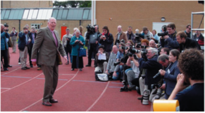 Sir Roger greets the world’s media at the Iffley Road track on the 50th anniversary of his historic run, May 6, 2004